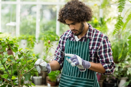 Workers and landscaping tools representing ethical business practices